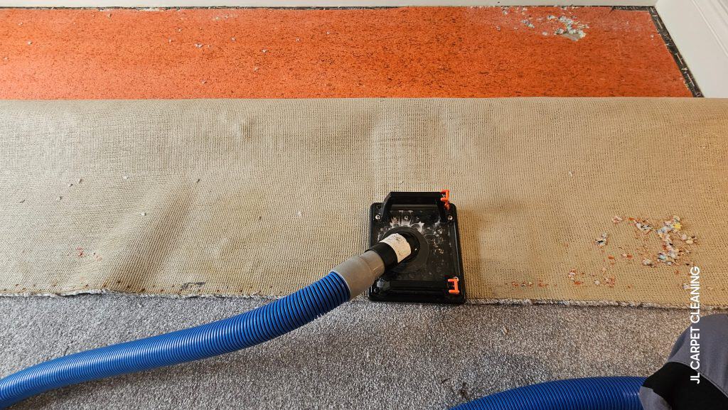 Urine treatment and extraction being carried out to carpet backing